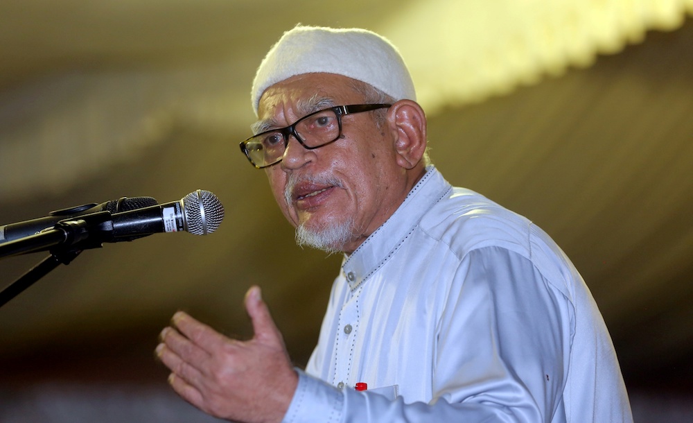 PAS president Datuk Seri Abdul Hadi Awang speaks at an ICERD protest in Kampung Gajah, Perak November 17, 2018. u00e2u20acu201d Picture by Farhan Najib