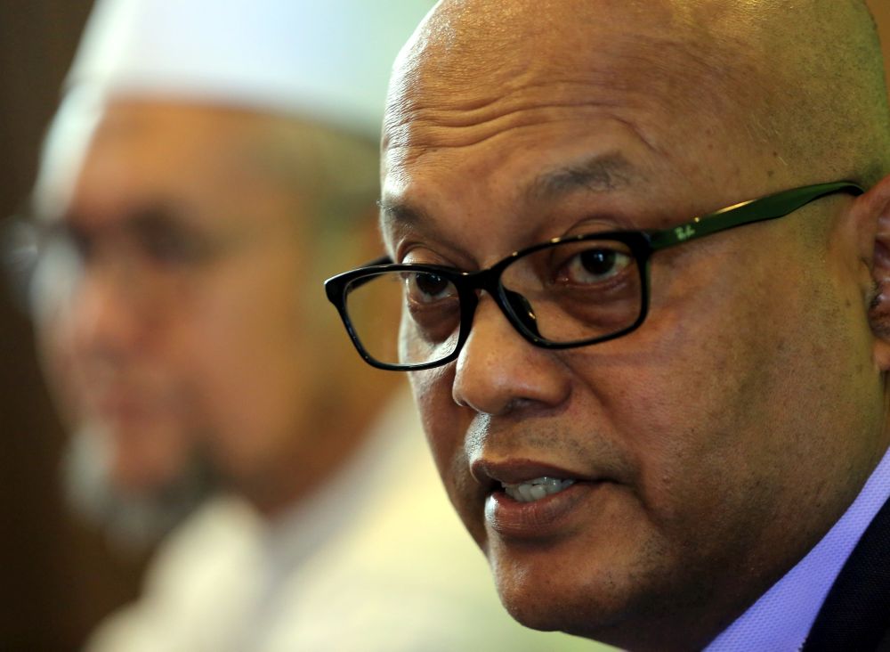 Perak Public Account Committee members Datuk Aznel Ibrahim (right) and Razman Zakaria speak at a press conference in Hotel Impiana, Ipoh November 19, 2018. u00e2u20acu201d Picture by Farhan Najib