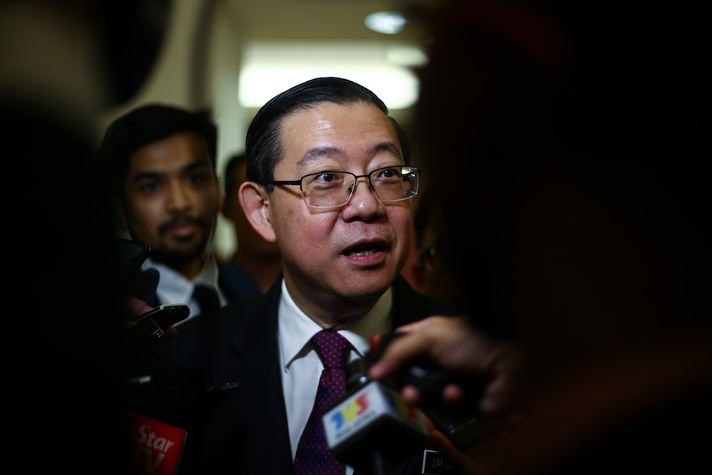 Finance Minister Lim Guan Eng answers reportersu00e2u20acu2122 questions in Parliament November 21, 2018. u00e2u20acu201d Picture by Ahmad Zamzahuri