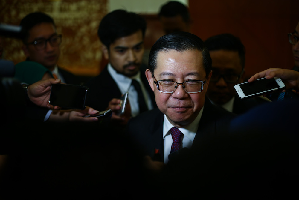 Finance Minister Lim Guan Eng answers reportersu00e2u20acu2122 questions in Parliament November 21, 2018. u00e2u20acu201d Picture by Ahmad Zamzahuri