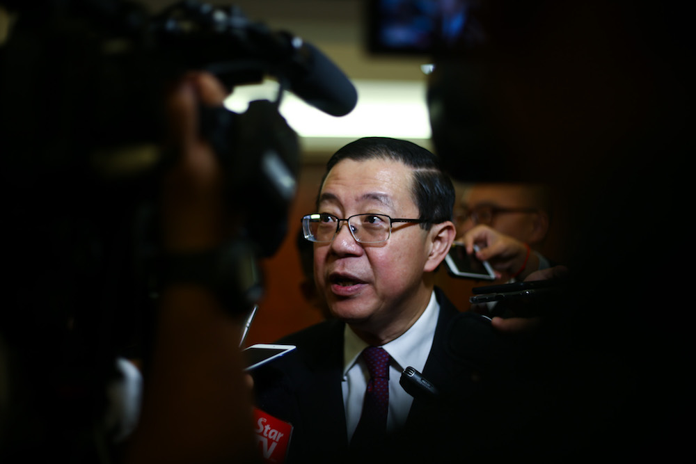 Finance Minister Lim Guan Eng answers reportersu00e2u20acu2122 questions in Parliament November 21, 2018. u00e2u20acu201d Picture by Ahmad Zamzahuri