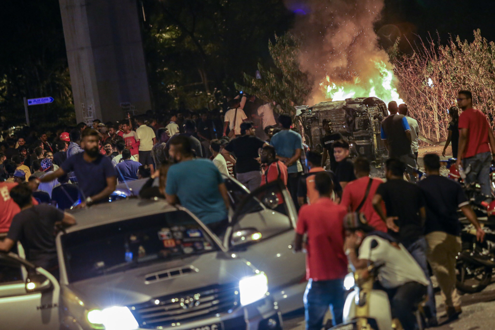 Several car wreckages were torched by the protesters that have gathered near the Sri Maha Mariamman temple compound as the protest enter its second day November 27, 2018. u00e2u20acu201d Picture by Hari Anggara 