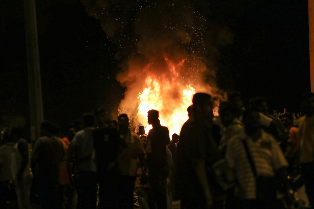 Several car wreckages were torched by the protesters that have gathered near the Sri Maha Mariamman temple compound as the protest enter its second day November 27, 2018. u00e2u20acu201d Picture by Hari Anggara 