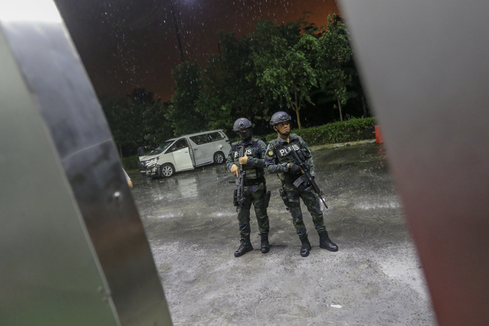 Armoured operatives from the General Operations Forces (PGA) have been deployed to secure the perimeter at the One City building in Petaling Jaya November 27, 2018. u00e2u20acu201d Picture by Azinuddin Ghazali