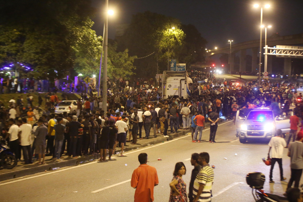 Protesters gather near the Sri Maha Mariamman temple compound as the protest enter its second day November 27, 2018. u00e2u20acu201d Picture by Azinuddin Ghazali