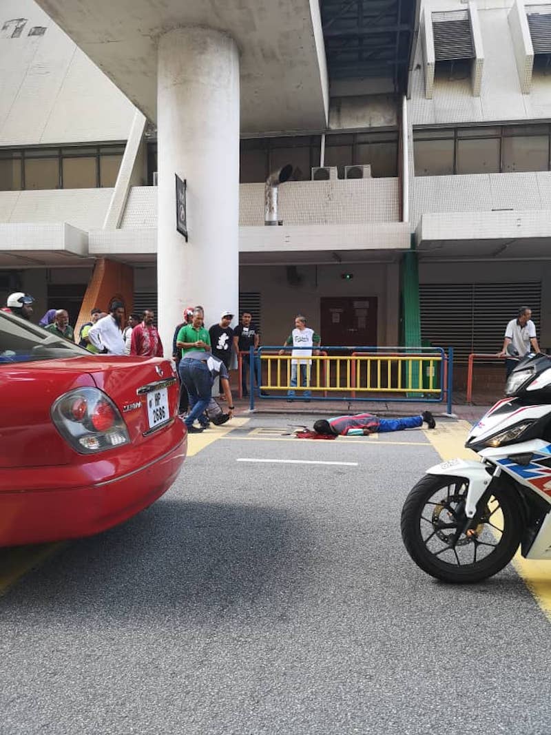 T. Shanmugasundram lies dead on Jalan Ria outside Komtar after getting shot in the head November 23, 2018.