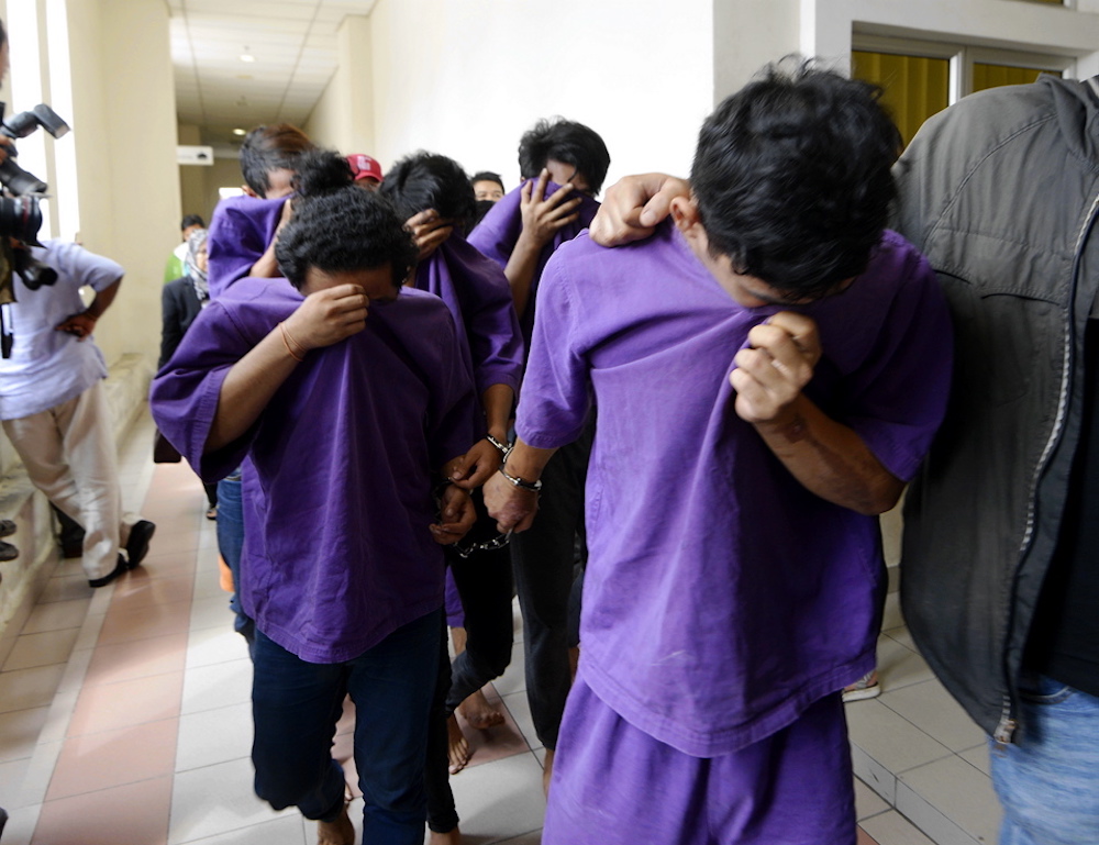 The suspects arrested for starting the chaos at the Sri Maha Mariamman Devasthanam temple are brought to the Petaling Jaya Court for remand hearing, November 27, 2018. u00e2u20acu201d Picture by Ham Abu Bakar