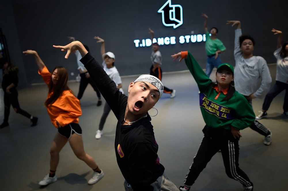 This picture taken on October 17, 2018, shows students practising street dance at T.I. Studio in Beijing. u00e2u20acu201d AFP pic 