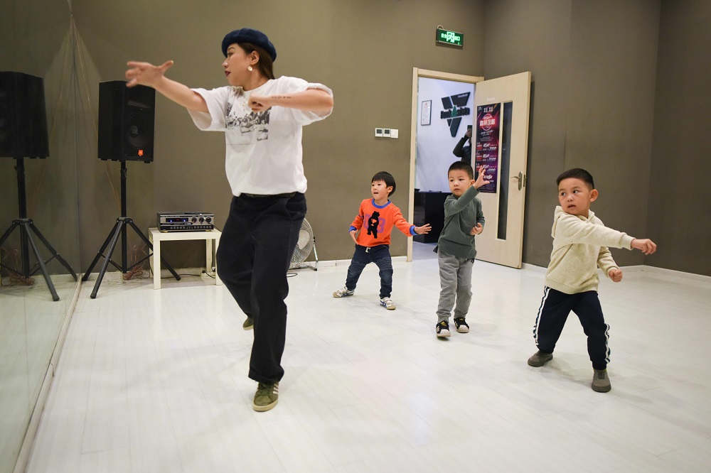 This picture taken on October 26, 2018, shows children practising at a street dance studio in Beijing. — AFP pic