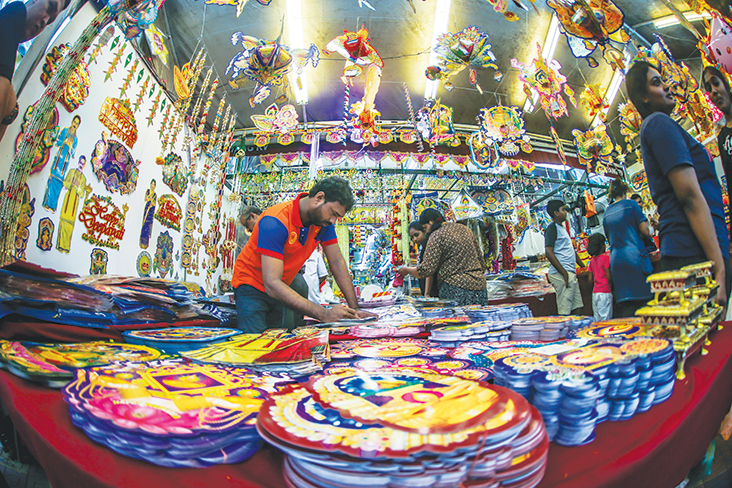 In Little India -- whether in Singapore or as pictured here in Brickfields, Kuala Lumpur -- Deepavali preparations start weeks before the actual day. — Picture by Hari Anggara.