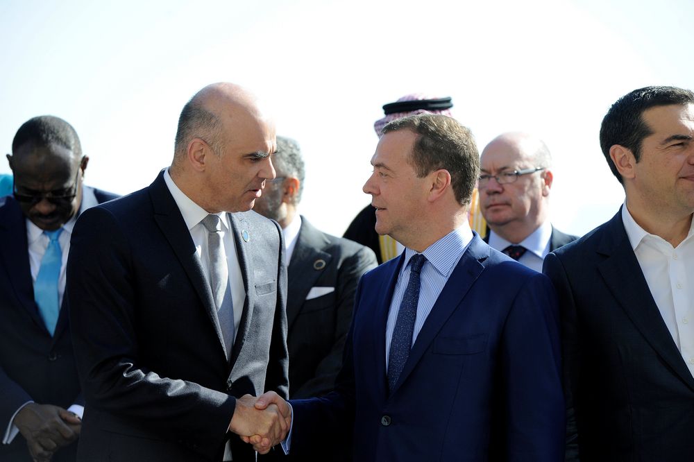 File picture shows Russian Prime Minister Dmitry Medvedev shaking hands with Swiss Confederationu00e2u20acu2122s President Alain Berset during the second day of the international conference on Libya in Palermo, Italy, November 13, 2018. u00e2u20acu201d Reuters pic