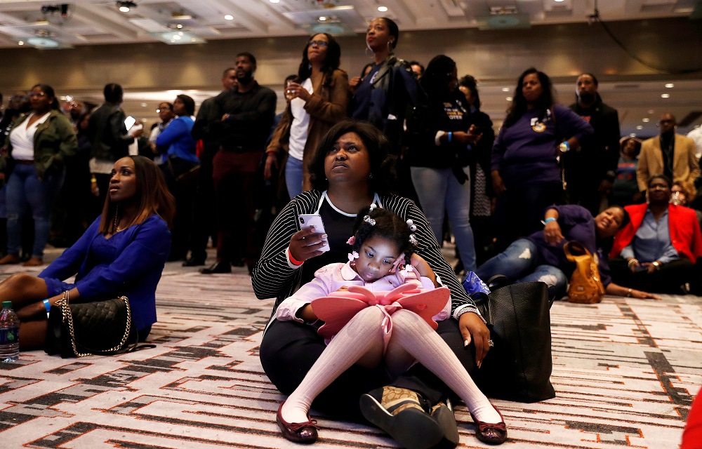 Deidre Brown Collins holds her daughter, Vitalia Collins, as they watch returns during a midterm election night party for Georgia Democratic gubernatorial nominee Stacey Abrams in Atlanta, Georgia, November 6, 2018. u00e2u20acu201d Reuters pic