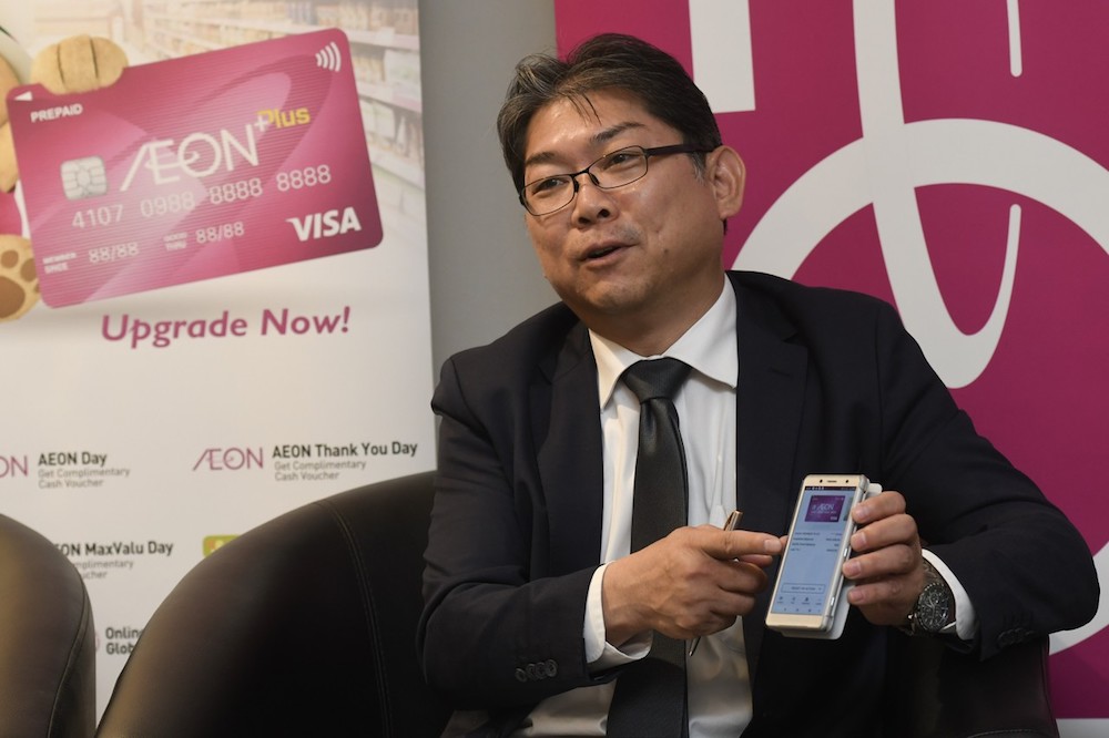 Aeon Credit Service (M) Berhad managing director Kenji Fujita explains its e-wallet during an interview in Kuala Lumpur November 5, 2018. u00e2u20acu201d Bernama pic