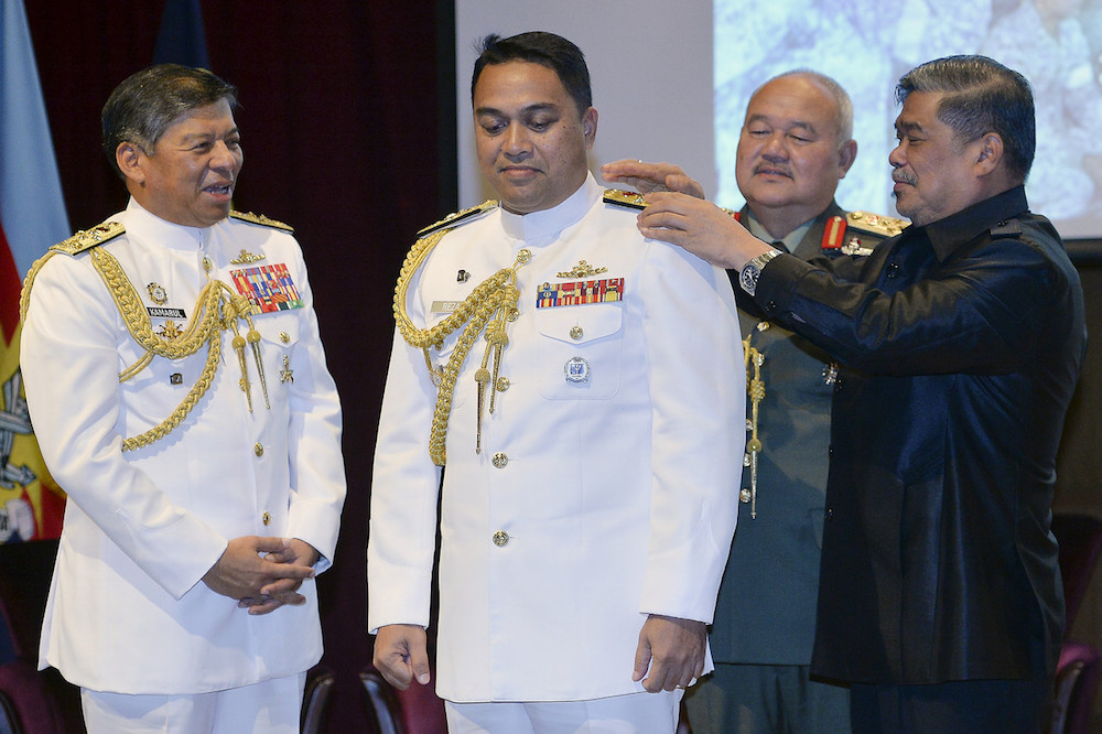 Defence Minister Mohamad Sabu conducts the pinning of rank ceremony for Admiral Datuk Mohd Reza Mohd Sany in Kuala Lumpur November 30, 2018. u00e2u20acu201d Bernama pic