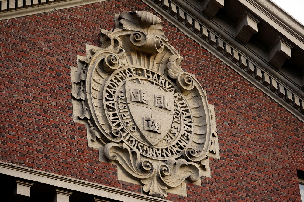 A seal hangs over a building at Harvard University in Cambridge, Massachusetts, November 16, 2012. u00e2u20acu201d Reuters pic