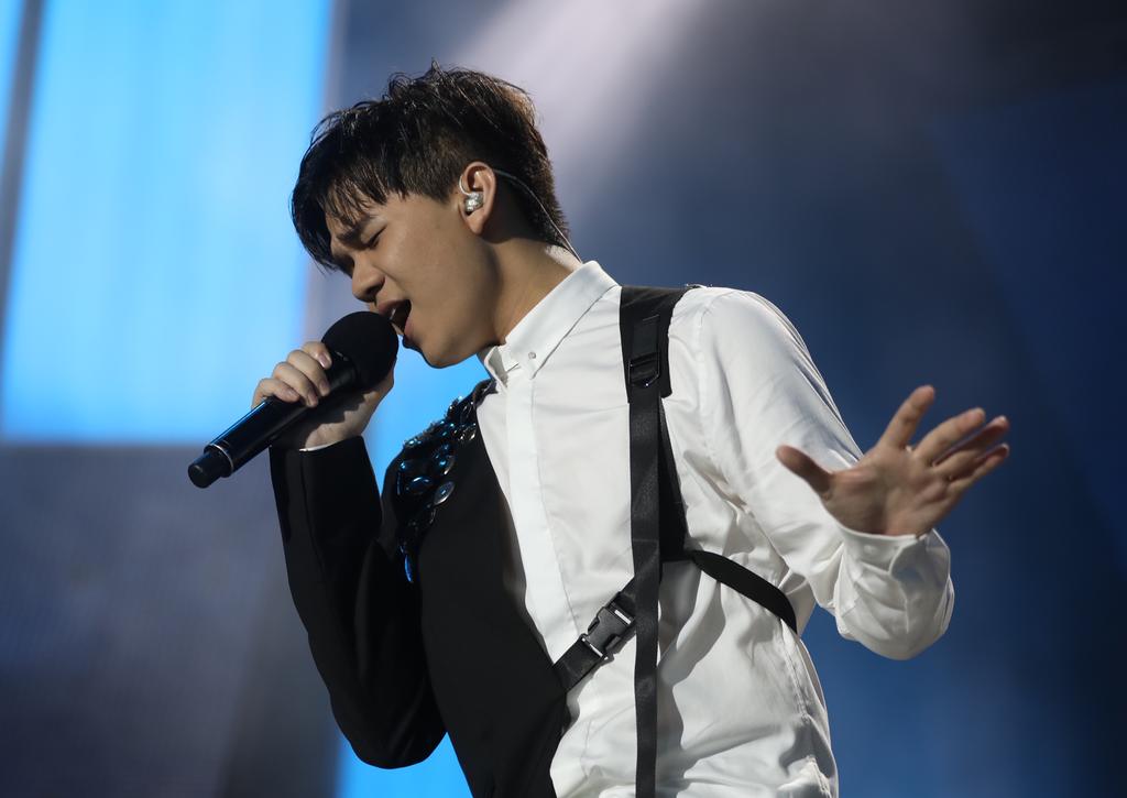 Jarrell Ng went home with a S$30,000 cash prize. He also received a debut single composed by renowned local musician Lee Wei Song. u00e2u20acu201d Raj Nadarajan/TODAY pic