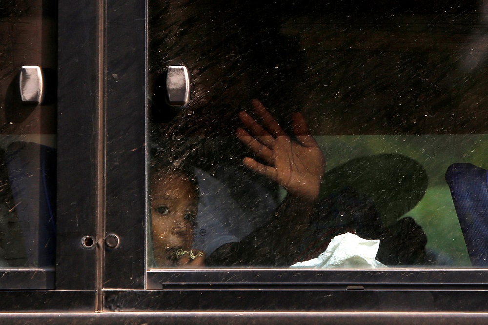 Rohingya people detained off Yangon on November 16 are seen in a bus before boarding a navy ship to return to the Rakhine camps in Yangon, Myanmar, November 18, 2018. u00e2u20acu201d Reuters pic