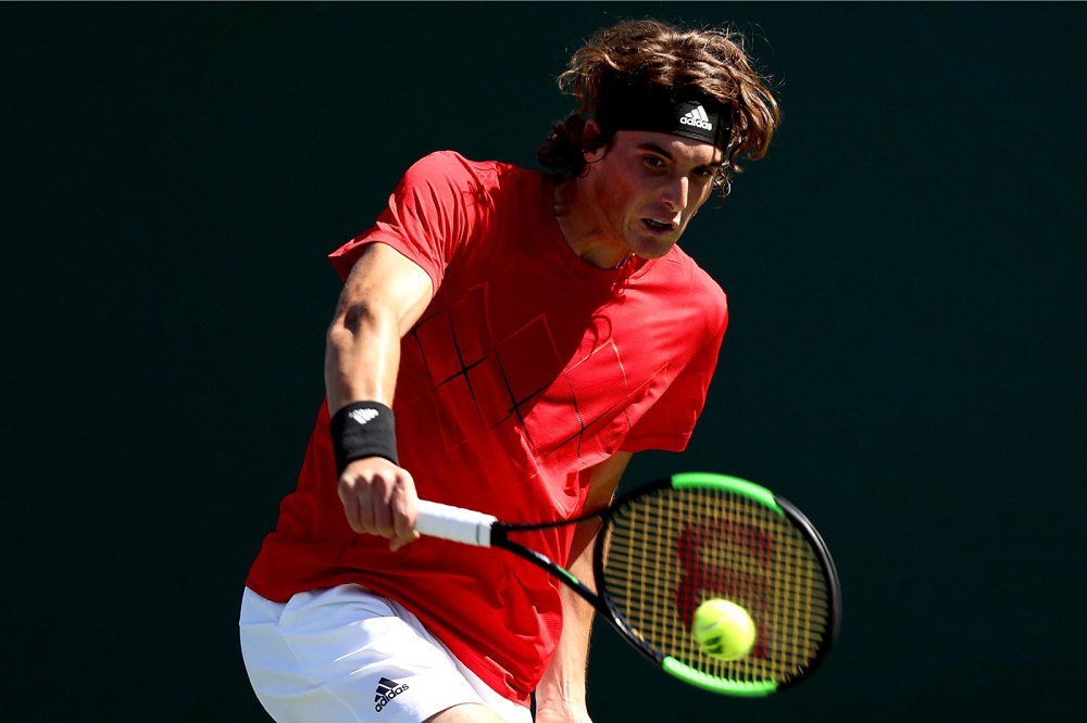 Stefanos Tsitsipas returns a shot to Daniil Medvedev during Day 4 of the Miami Open at the Crandon Park Tennis Centre in Florida March 22, 2018. u00e2u20acu201d AFP pic