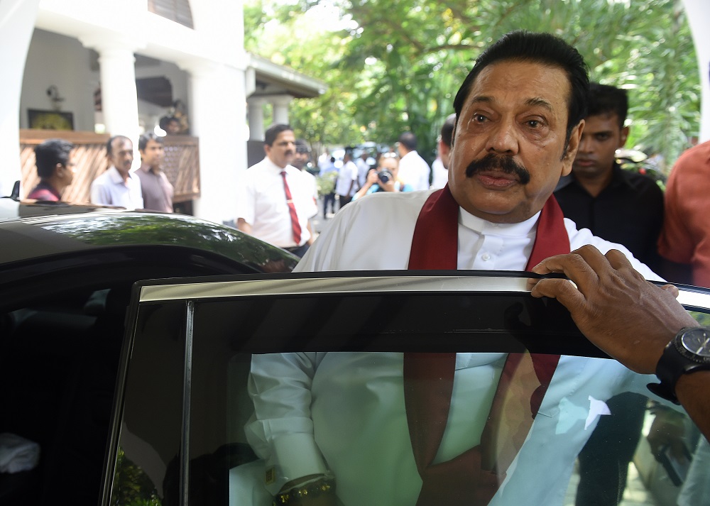 Sri Lanka's former president Mahinda Rajapakse leaves the official residence in Colombo on November 11, 2018. u00e2u20acu201d AFP pic