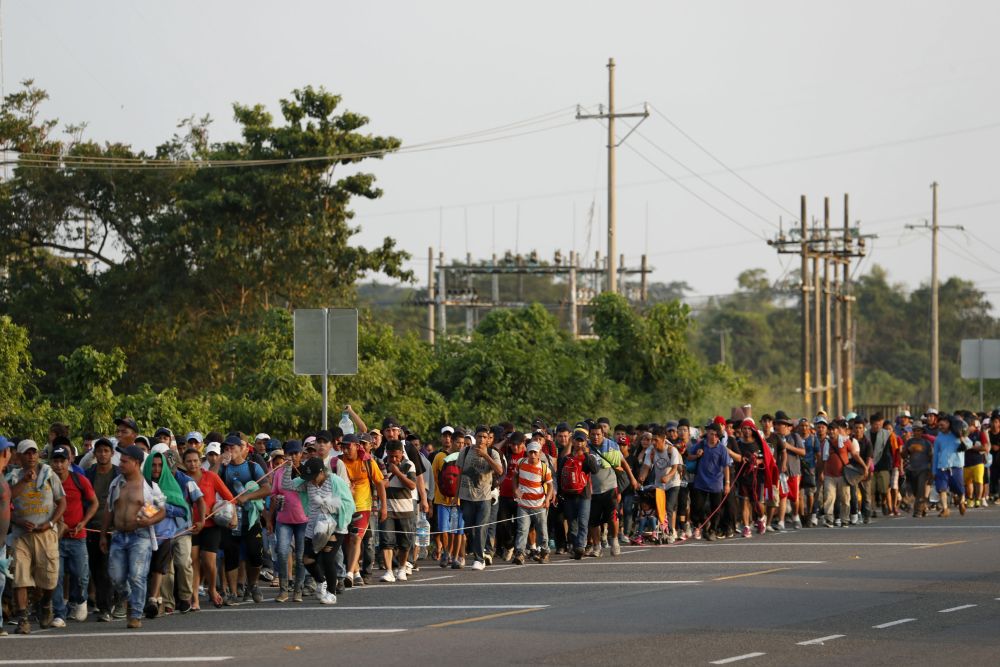 Migrants, part of a caravan travelling from Central America en route to the United States walk by the road that links Ciudad Hidalgo with Tapachula, Mexico November 2, 2018. u00e2u20acu2022 Reuters pic 