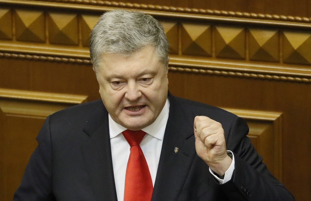 Ukrainian President Petro Poroshenko speaks during a parliament session to review his proposal to introduce martial law for 60 days after Russia seized Ukrainian naval ships off the coast of Crimea, in Kiev, Ukraine November 26, 2018. u00e2u20acu201d Reuters pic