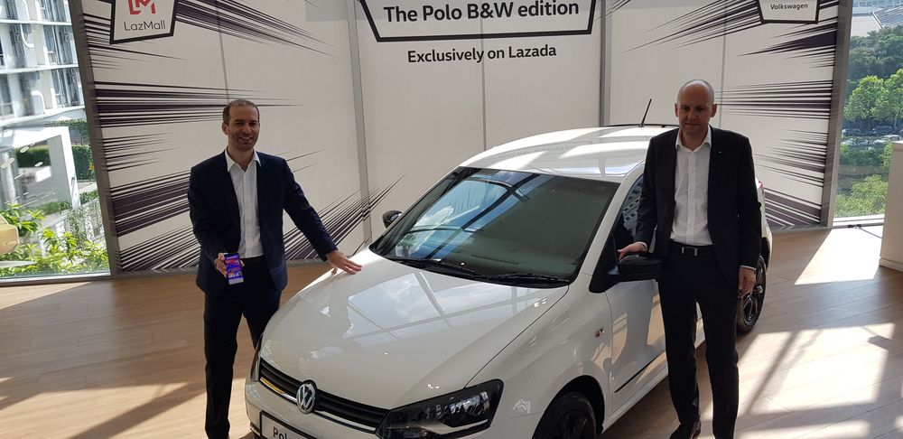 Christopher Lejeune, CEO of Lazada (left) and Erik Winter, MD of Volkswagen Passenger Cars Malaysia unveil the Polo Black and White edition. u00e2u20acu201d Picture by YS Khong