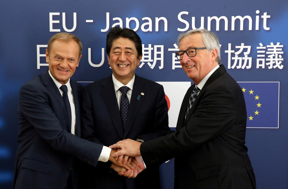 Japan's Prime Minister Shinzo Abe (centre) welcomed by European Council President Donald Tusk (left) and EC President Jean-Claude Juncker for talks in Brussels, Belgium July 6, 2017. u00e2u20acu201d Reuters pic