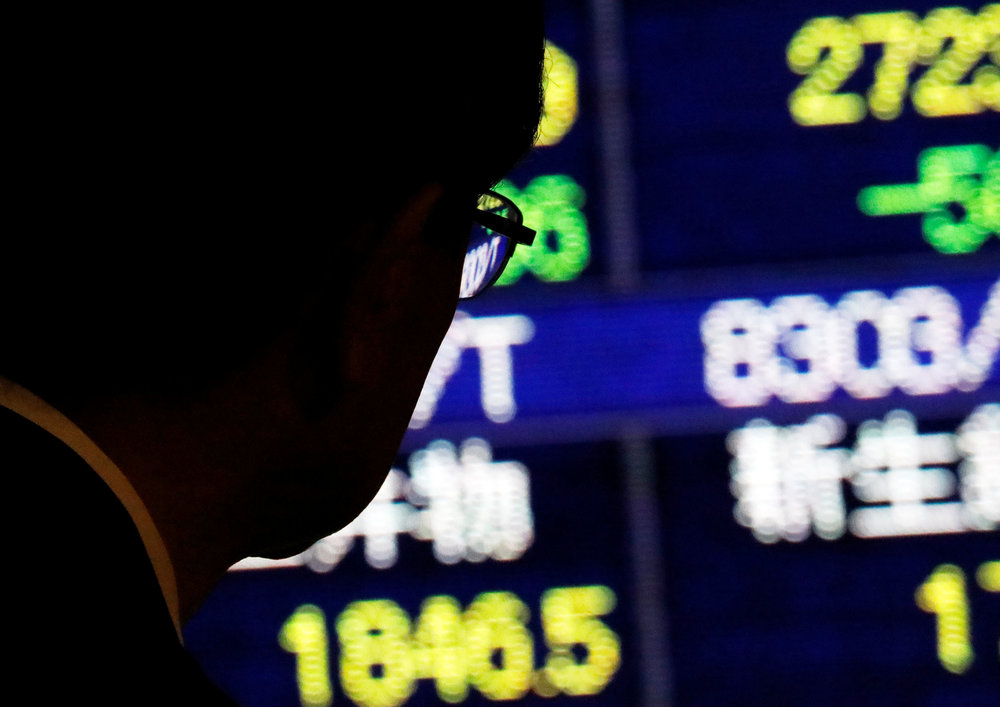 A man looks at an electronic stock quotation board outside a brokerage in Tokyo November 13, 2018. u00e2u20acu201d Reuters pic