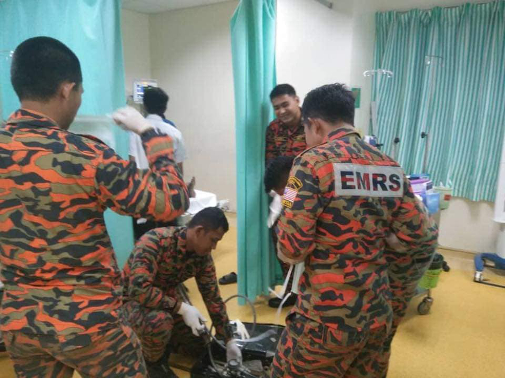 A group of firemen performed a special rescue mission on a man whose private parts was found stuck inside a PVC pipe today. u00e2u20acu201d Picture via Facebook/Fire & Rescue Department of Malaysia