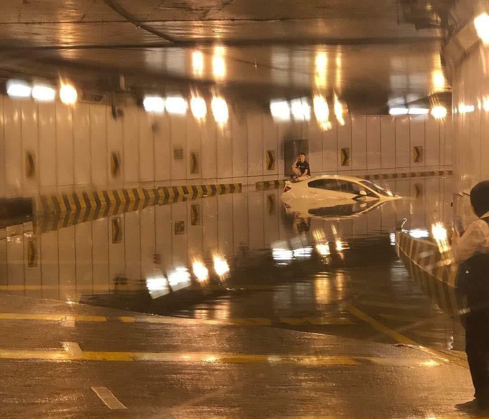 A car was left half-submerged in the Jalan Tun Razak underpass near KLCC following two hours of heavy rainfall in Kuala Lumpur on November 11, 2018.