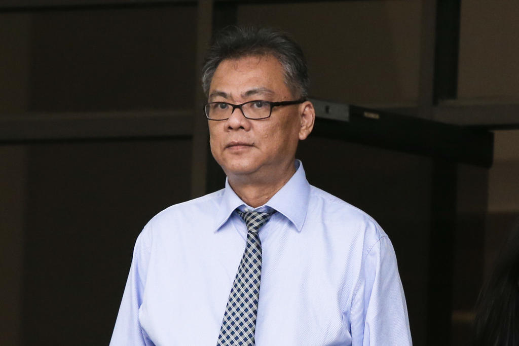 Cheng Choong Hung, 55, faces a total of 120 charges for offences such as cheating, money laundering, and engaging in corrupt transactions. u00e2u20acu201d Koh Mui Fong/TODAY pic