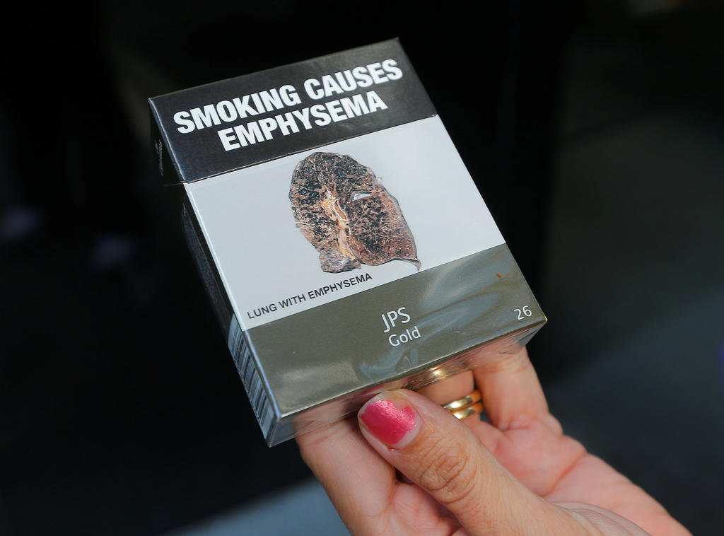 An example of restrictive tobacco packaging on cigarettes in Australia. Singapore is moving to enact similar laws for tobacco products to have standardised packaging, where cigarette packs will have the same look, shape and size. u00e2u20acu201d Reuters pic