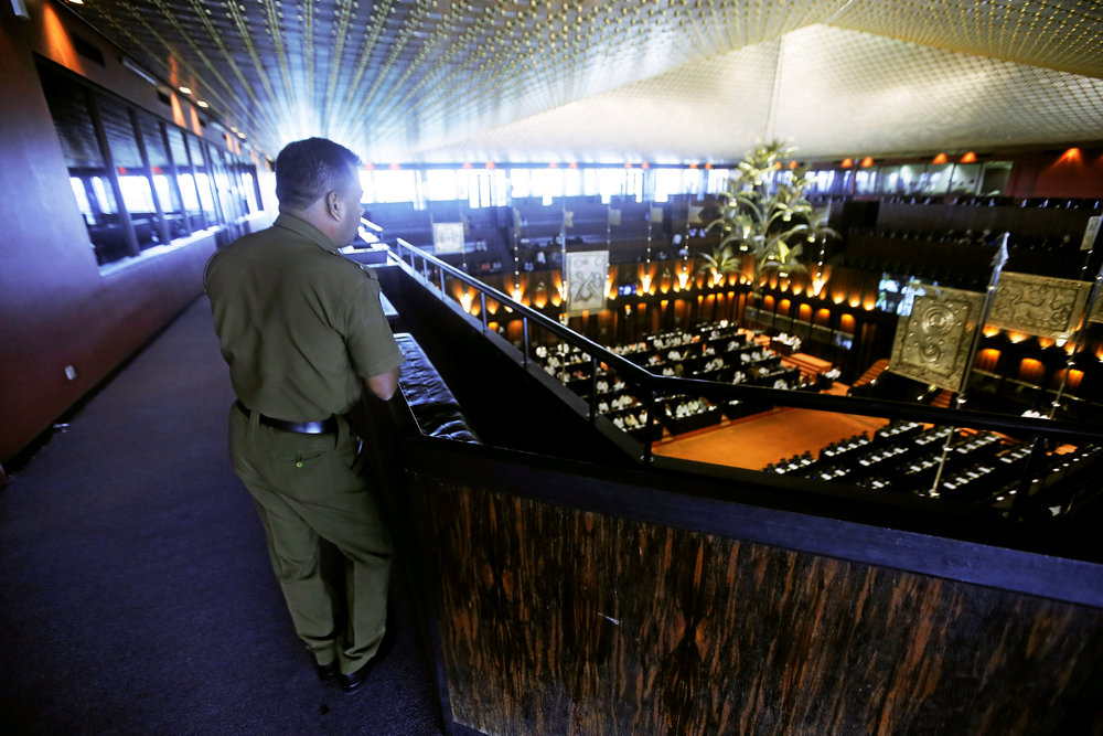 A police officer watches the parliament session while on duty in Colombo, Sri Lanka November 29, 2018. u00e2u20acu201d Reuters pic