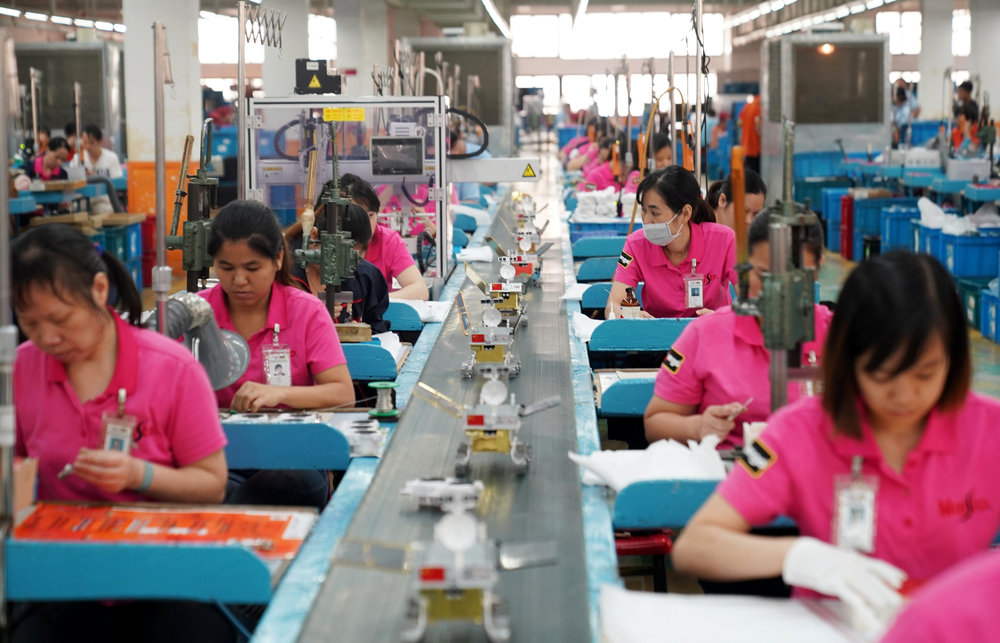 Employees work at a production line assembling scale models of the moon rover for China's Chang'e 4 lunar probe, at a factory in Dongguan, Guangdong province, China November 16, 2018. u00e2u20acu201d Reuters pic