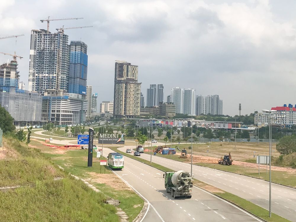Residential buildings under construction at Forest City in Johor. u00e2u20acu201d Picture by Ben Tan
