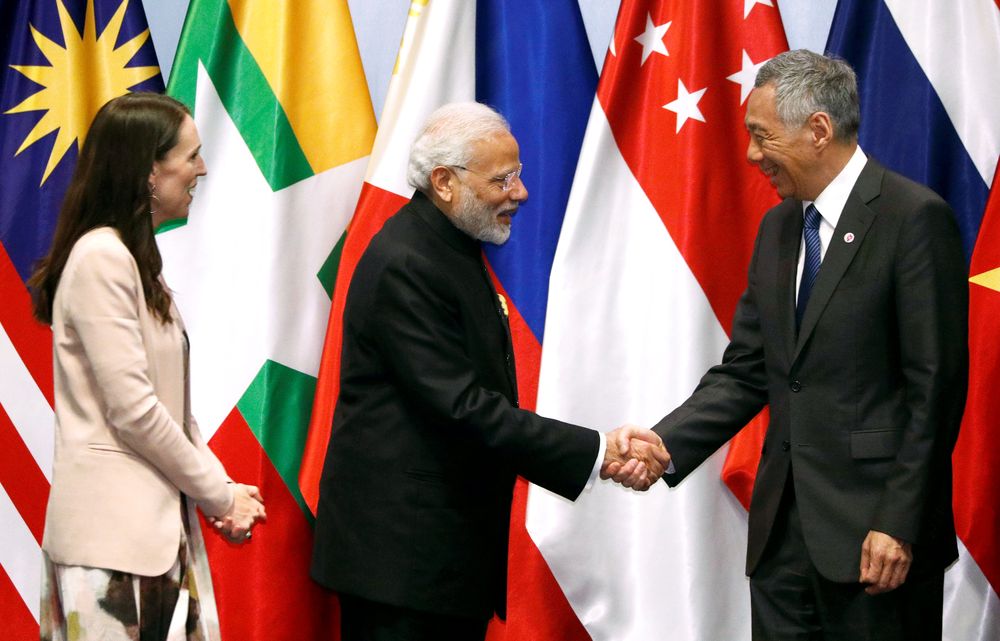 Indiau00e2u20acu2122s Prime Minister Narendra Modi speaks with Singaporeu00e2u20acu2122s Prime Minister Lee Hsien Loong and New Zealandu00e2u20acu2122s Prime Minister Jacinda Ardern at the RCEP meeting in Singapore November 14, 2018. u00e2u20acu201d Reuters pic