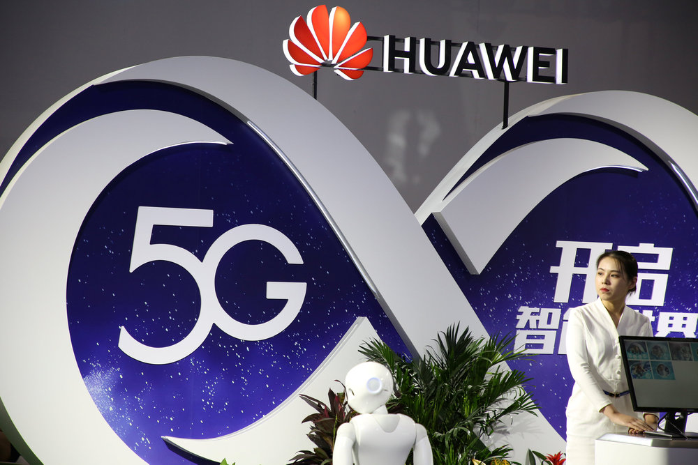 A woman stands at the booth of Huawei featuring 5G technology at the PT Expo in Beijing, China September 28, 2018. — Reuters pic