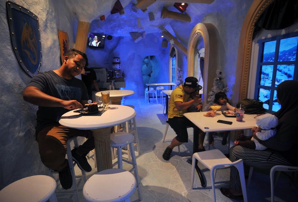 Guests enjoy a variety of delicious desserts such as ice cream, fruits and cakes at the Ice Cafu00c3u00a9 located on Victoria Street, George Town, Penang. u00e2u20acu201d Bernama pic