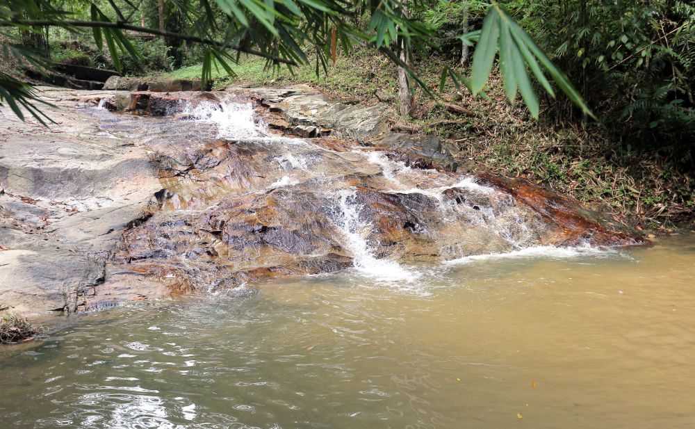 The waterfall in Jeram Papan has a cascading waterfall with several slopes and rich with bright gray granite rocks. ― Picture by Farhan Najib
