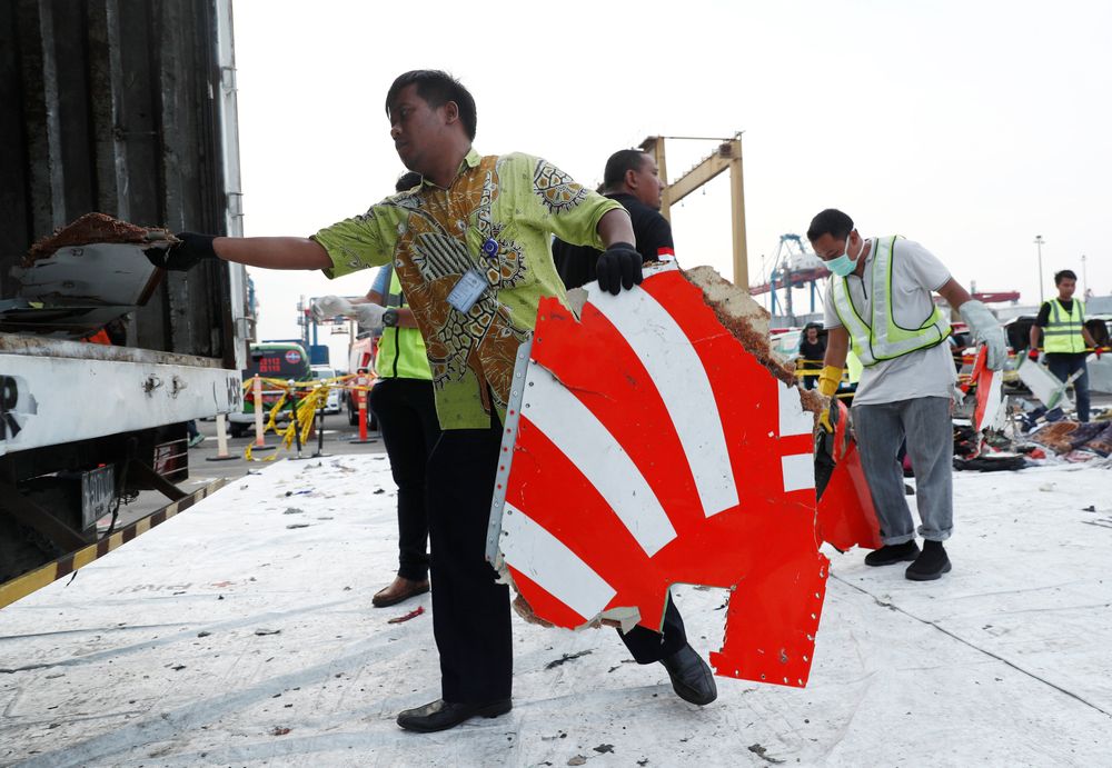 Workers load up recovered debris and belongings believed to be from Lion Air flight JT610 onto a truck at Tanjung Priok port in Jakarta, Indonesia, November 2, 2018. u00e2u20acu201d Reuters pic