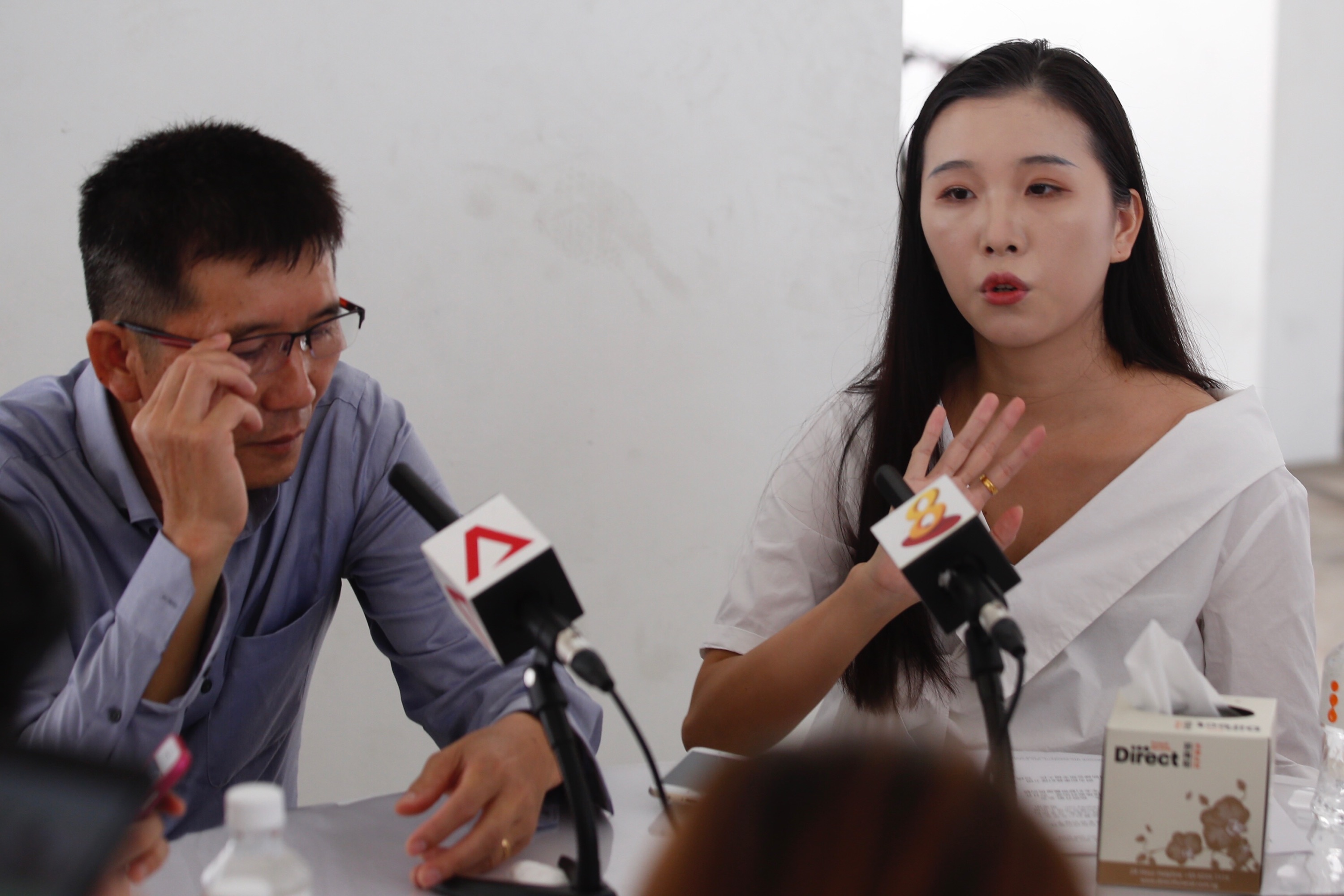 The father and sister of the late CFC Liu Kai speaking to the media on Nov 5. u00e2u20acu201d Picture by Najeer/TODAY pic