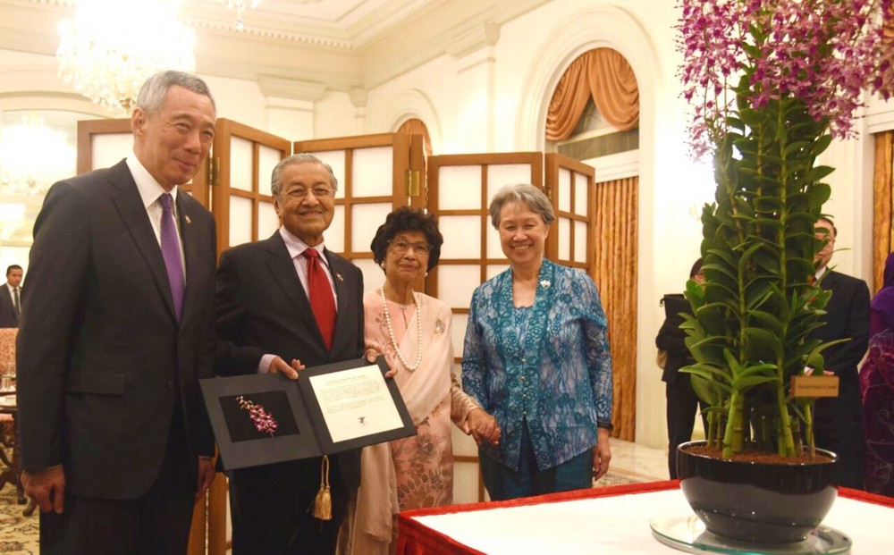 Singapore named a variety of orchid Dendrobium Mahathir Siti Hasmah at the Istana in Singapore November 12, 2018. u00e2u20acu201d Picture courtesy of the Department of Information Malaysia