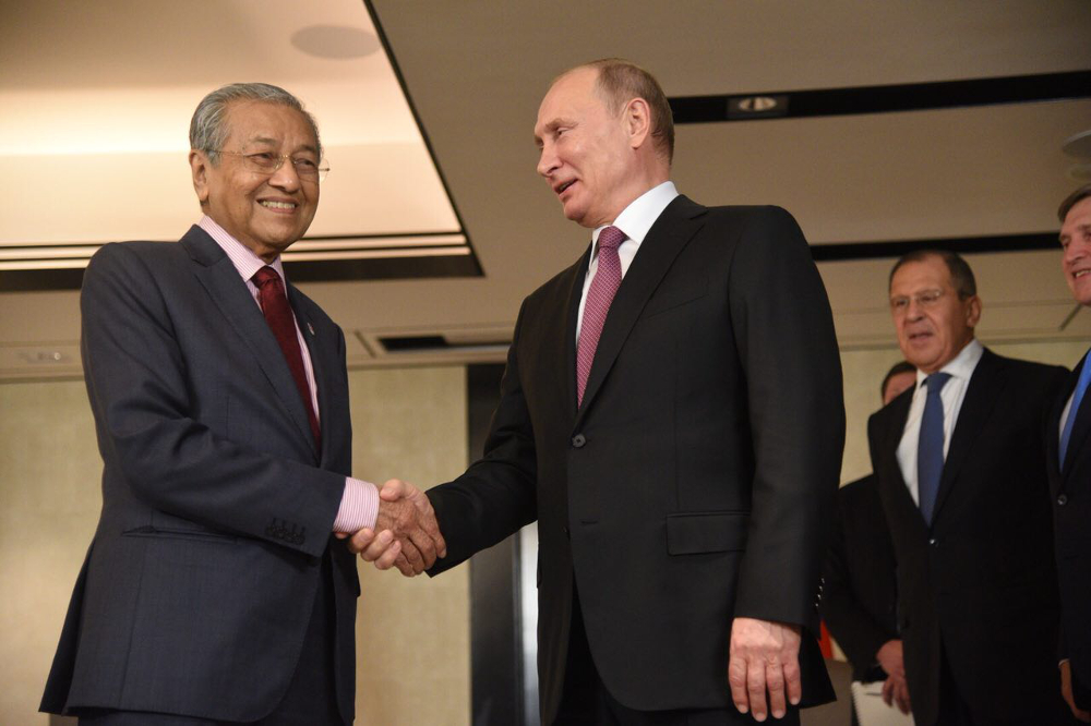 Prime Minister Tun Dr Mahathir Mohamad and Russian President Vladimir Putin meet for bilateral talks in Singapore November 13, 2018.  u00e2u20acu201d Picture courtesy of the Department of Information Malaysia 