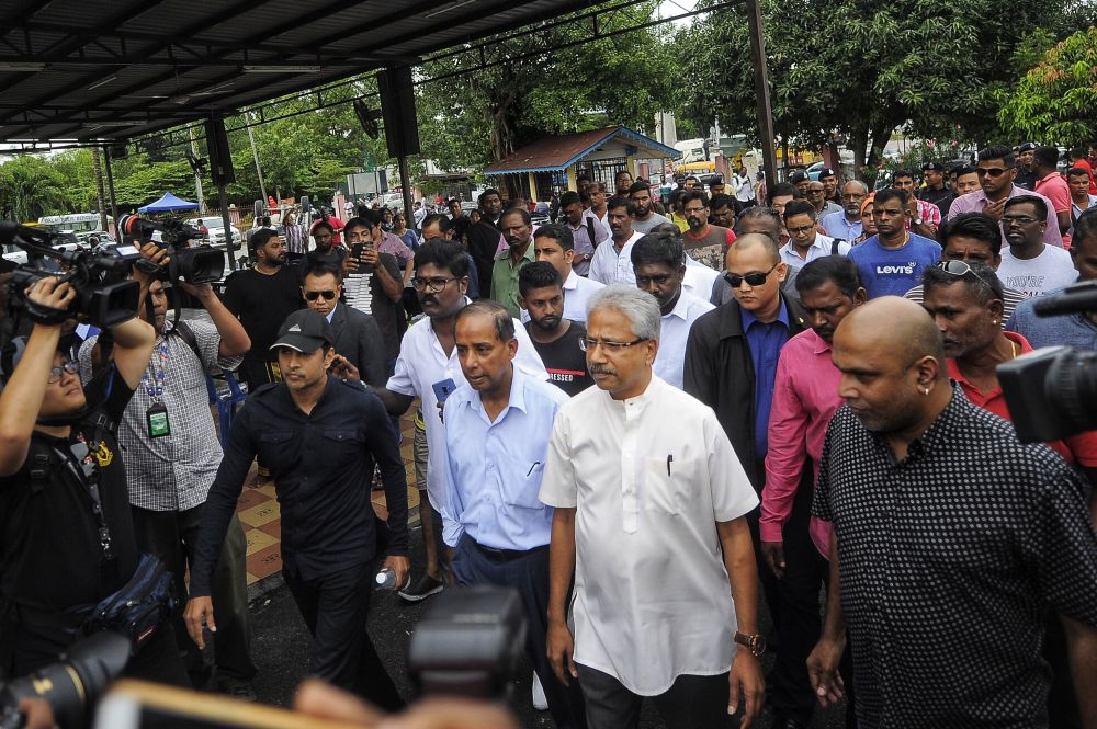 Human Resources Minister M. Kulasegaran (third from right) and senator P. Waytha Moorthy (centre) visits the Sri Maha Mariammam Devasthanam temple in USJ 25 November 27, 2018. u00e2u20acu201d Picture by Shafwan Zaidon
