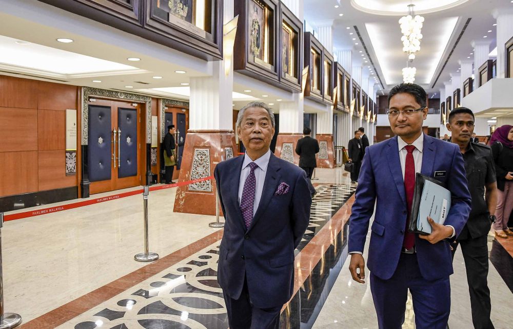 Tan Sri Muhyiddin Yassin (left) is pictured at Parliament in Kuala Lumpur November 13, 2018. u00e2u20acu201d Picture by Firdaus Latif