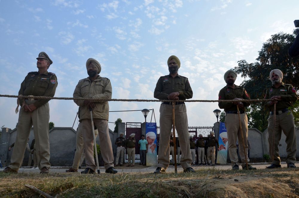 Police stand guard after a grenade blast outside a Sikh religious gathering site on the outskirts of Amritsar, India, November 18, 2018. u00e2u20acu201d Reuters pic