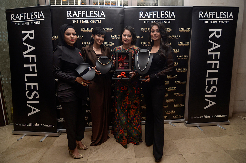 Malaysian artists (from left) Alyah Abu Hasan, Fauziah Latif, Farhan Azizan and Tasha Shilla with items sponsored by Rafflesia at Le Méridien Hotel November 12, 2018.