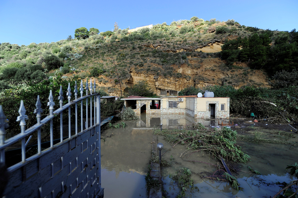 A general view shows a partially submerged house, where according to local media nine people died in, due to the flood-affected river Milicia, in Casteldaccia November 4, 2018. u00e2u20acu201d Reuters pic