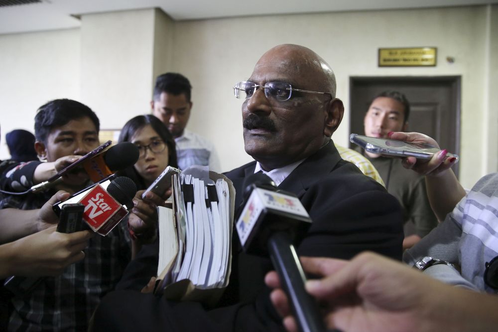Lawyer S. Mogan, who represents the 'pro-stay' faction of the Sri Maha Mariamman Devasathanam temple, speaks to reporters at the Shah Alam High Court November 29, 2018. u00e2u20acu2022 Picture by Yusof Mat Isa