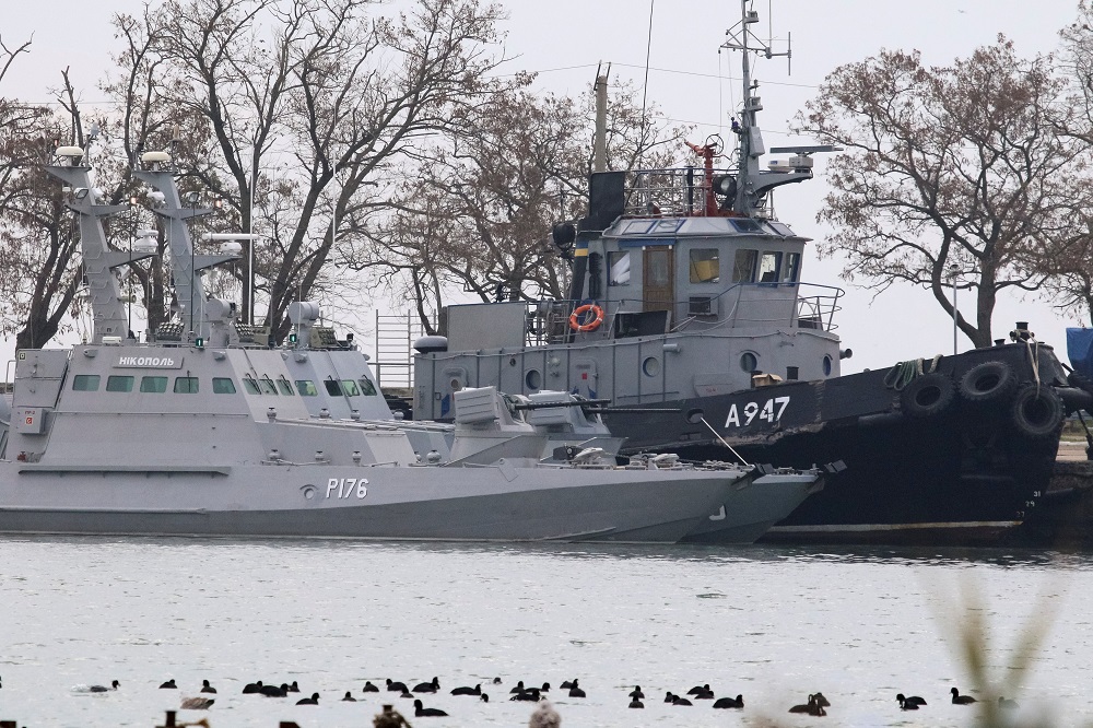Seized Ukrainian ships, small armoured artillery ships and a tug boat, are seen anchored in a port of Kerch, Ukraine November 26, 2018. u00e2u20acu201d Reuters pic 